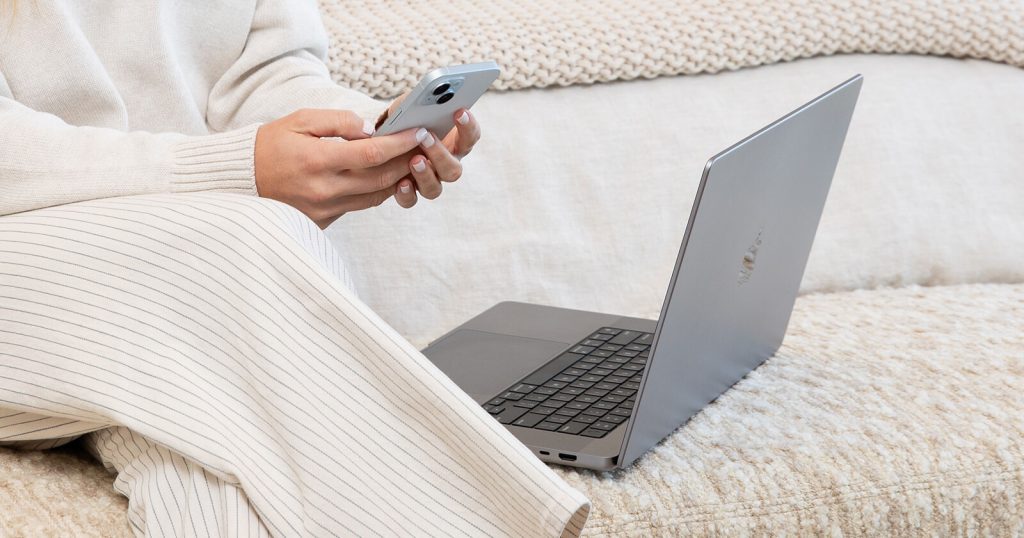 The image shows working from a comfy space like a couch. 